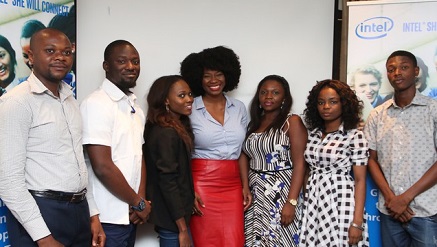 Titilope Sonuga,(m) flanked by Bloggers at a recent hangout.
